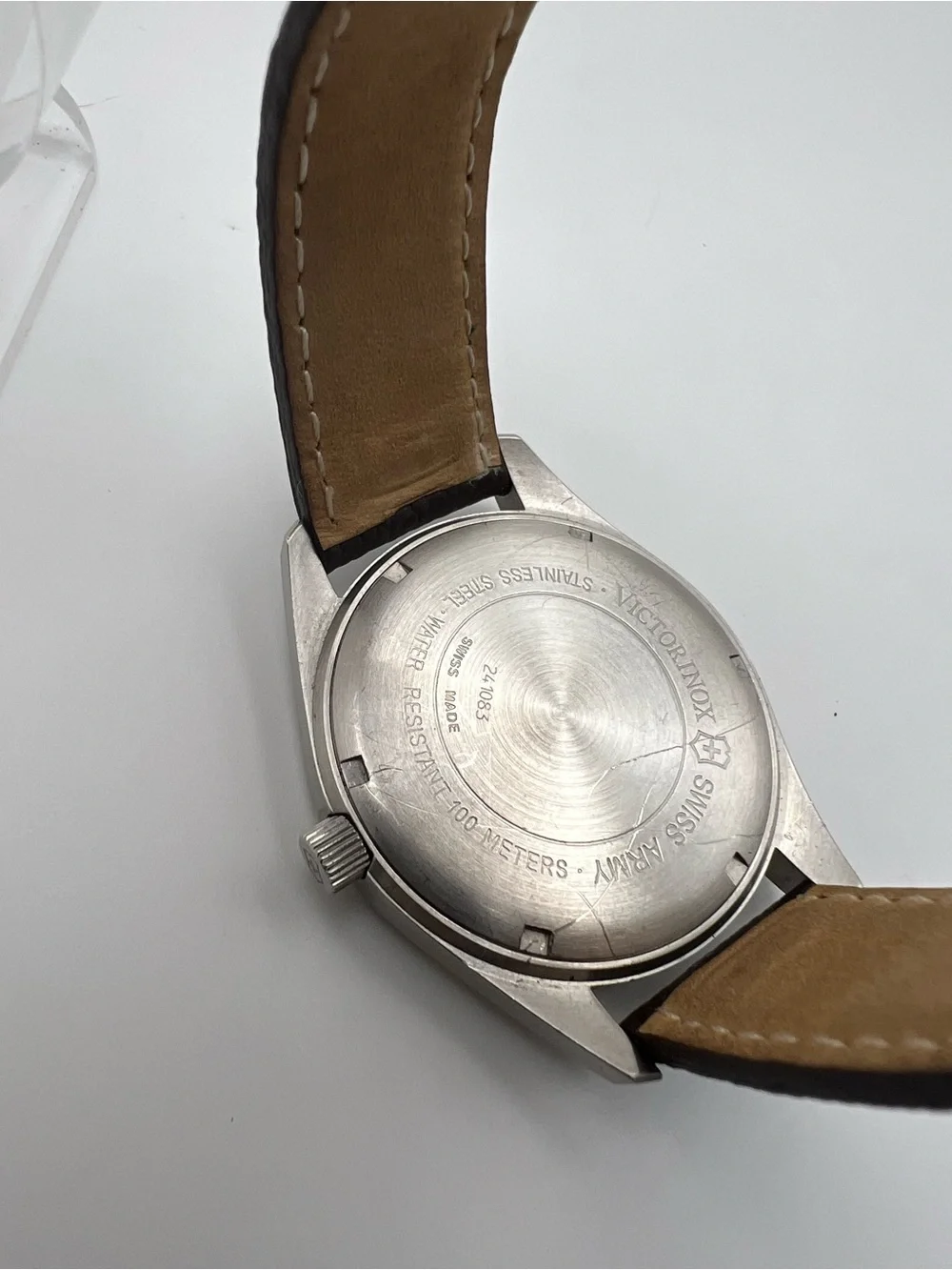 Victorinox Black Dial Watch with Brown Leather Strap and Red Accents